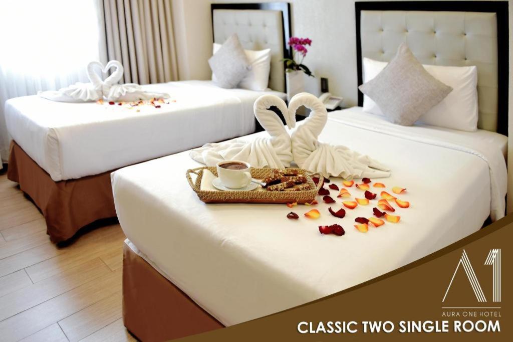 באגויו Aura One Hotel מראה חיצוני תמונה