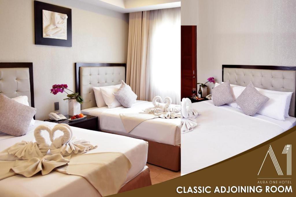 באגויו Aura One Hotel מראה חיצוני תמונה