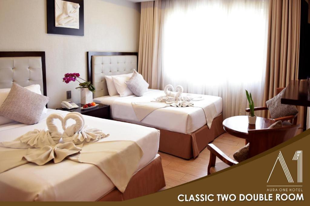 באגויו Aura One Hotel מראה חיצוני תמונה
